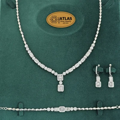 سرویس نقره جواهری زنانه امرالدکات با نگین های برلیان و باگت 32.6 گرمی نقره اصل 925